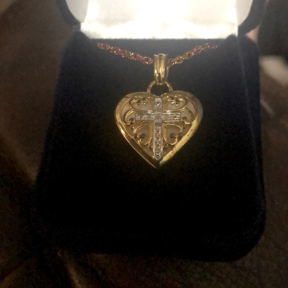 Danbury Mint heart cross necklace for daughters.